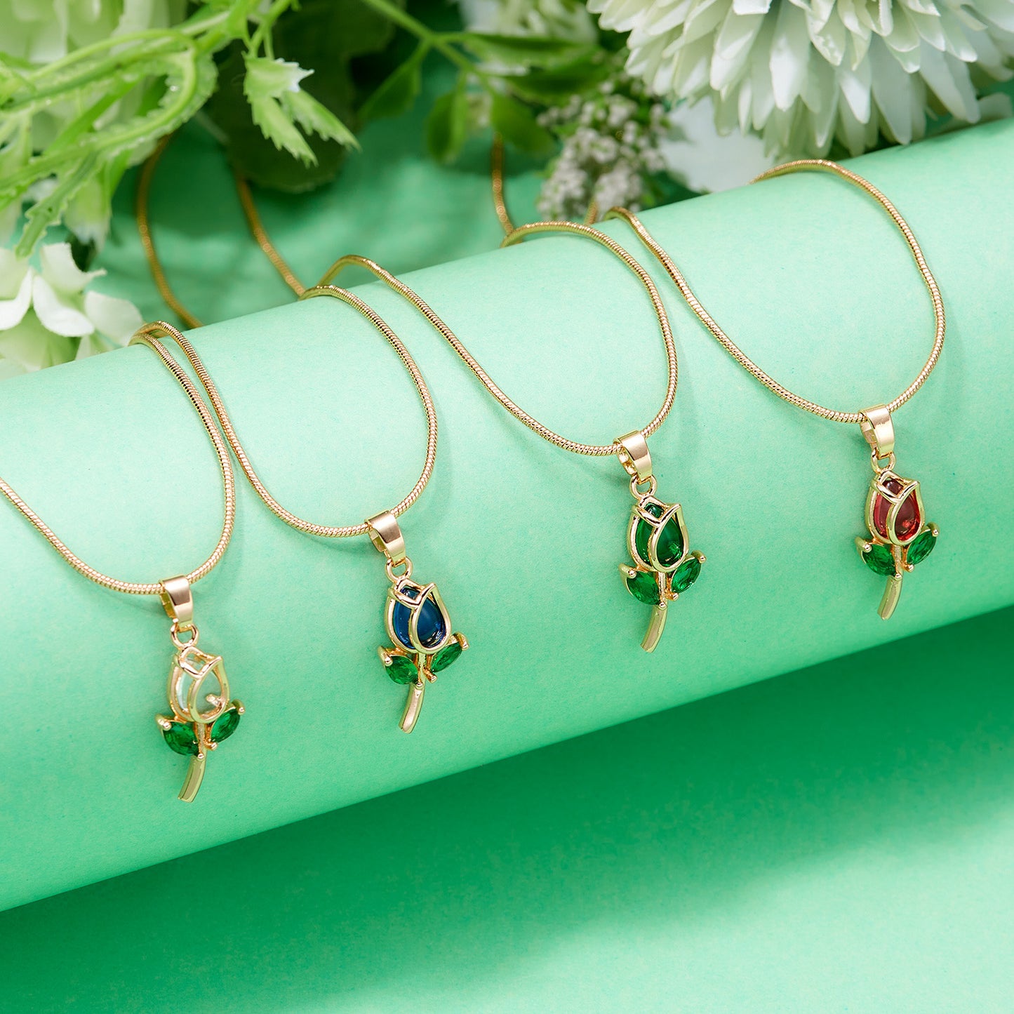 Gold chain with tulip pendant