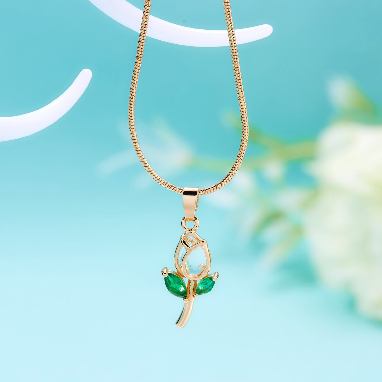 Gold chain with tulip pendant