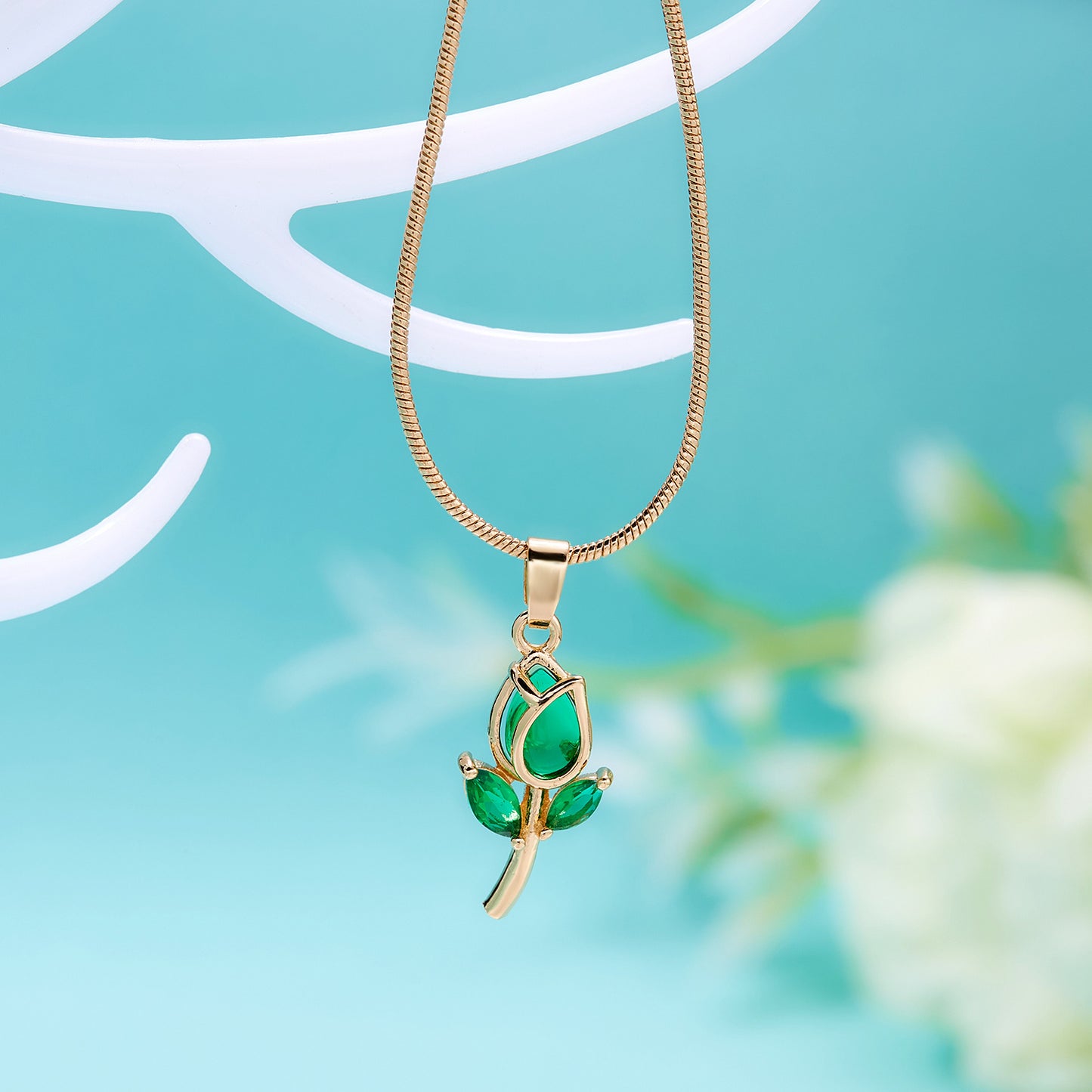 Gold chain with tulip pendant