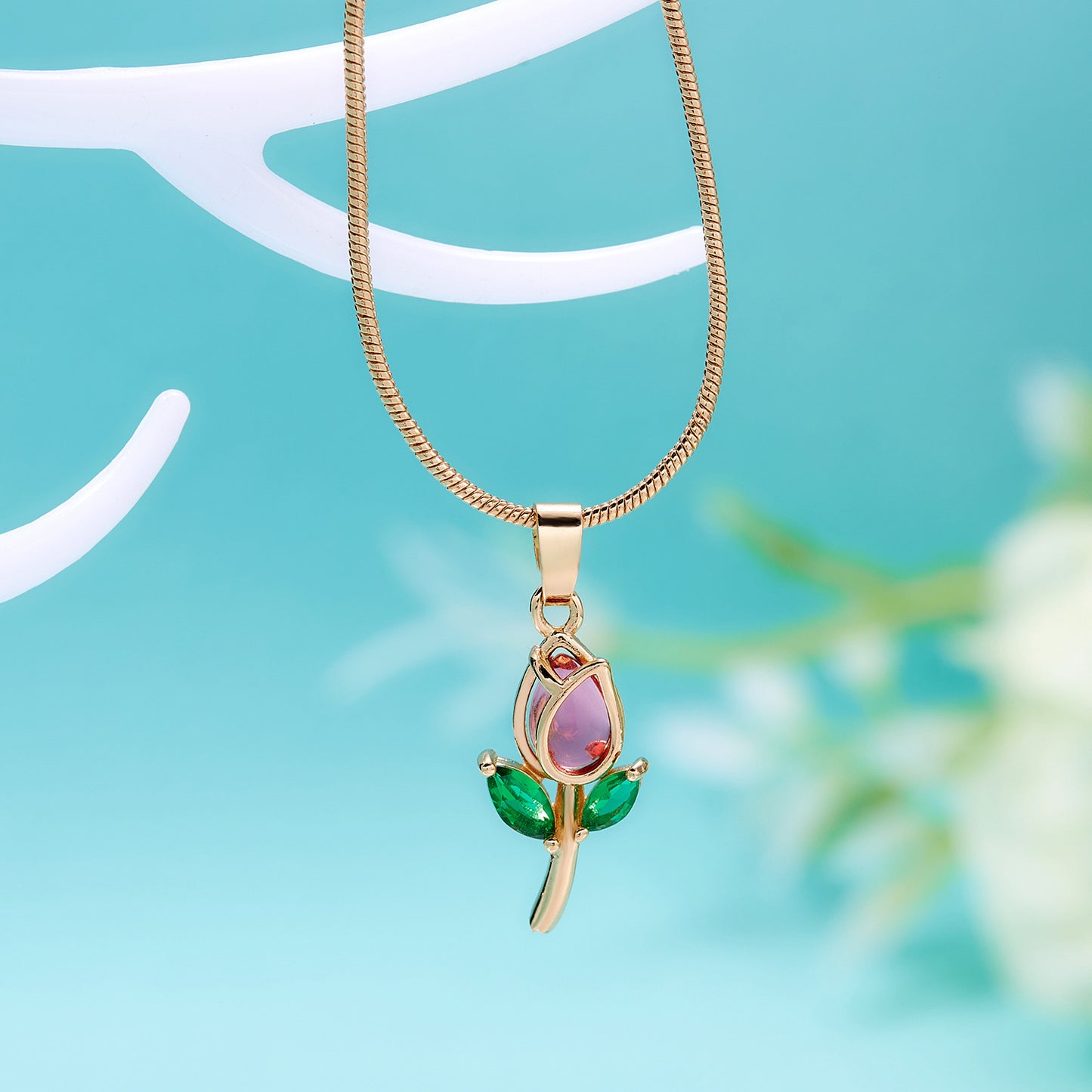 Gold chain with tulip pendant
