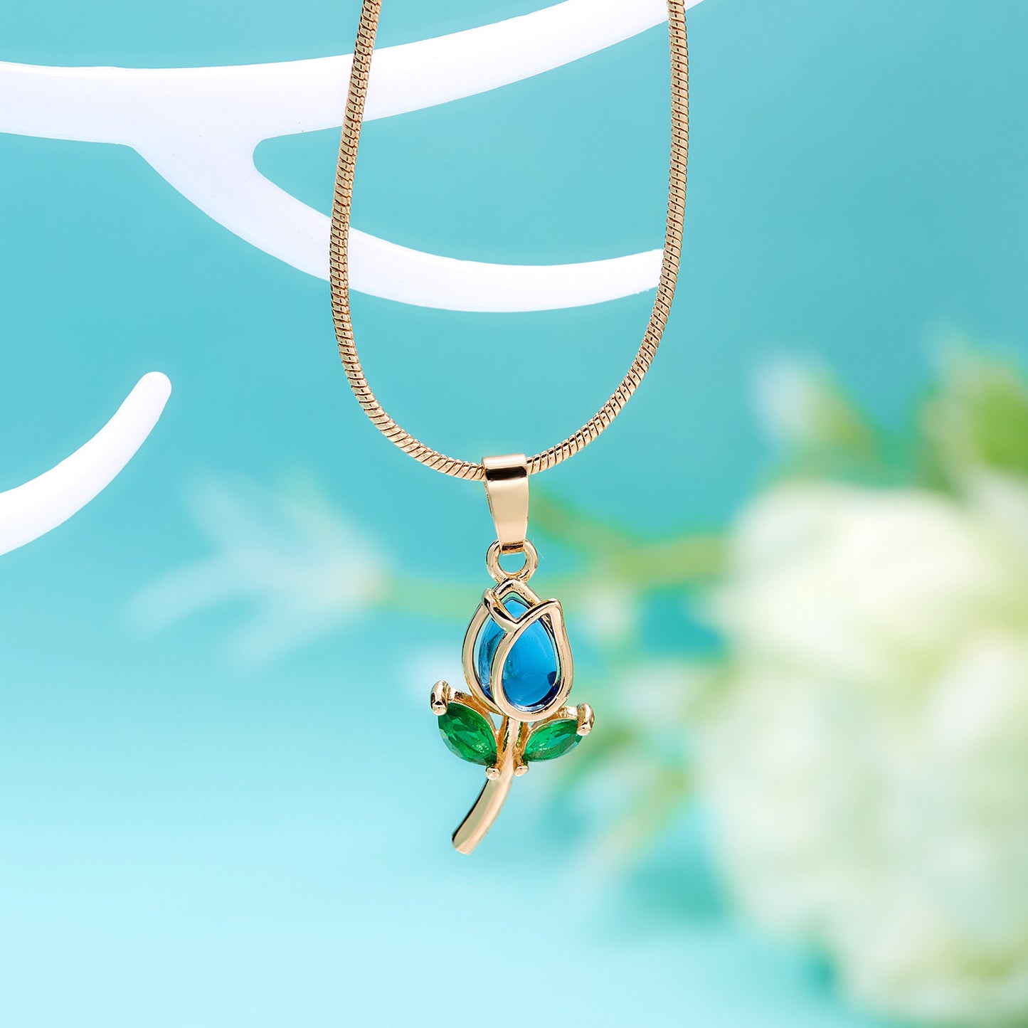Gold chain with tulip pendant